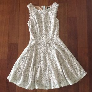 A white city studio dress